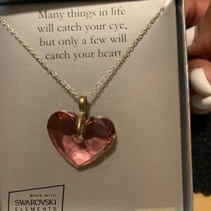 Pink diamond cut heart necklace.